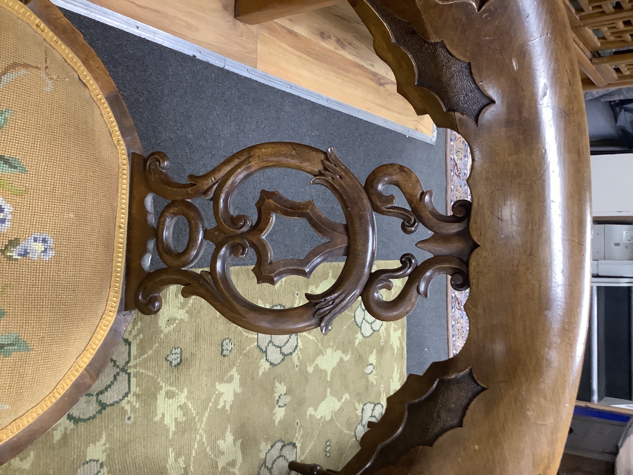 A Victorian carved walnut elbow chair, width 58cm, depth 48cm, height 90cm
